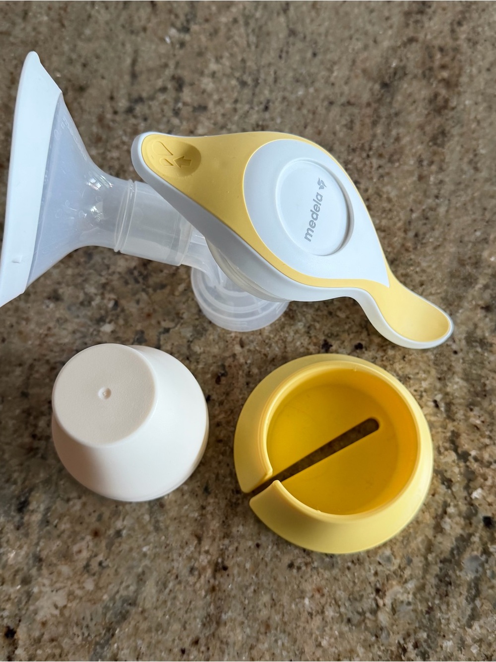 Medela White and Yellow Manual Breast Pump with Comfort Handle
